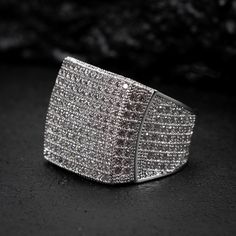 White Gold Plated Mens Cz Micro Pave Iced Large Hip Hop Statement Pinky Ring Material: 14k White Gold Plating/Jewelers Brass Available In Sizes: 6,7,8,9,10 Or 11 Weight: 12.4 Grams Band Width 15mm Iced Out White Gold Promise Ring Jewelry, White Gold Iced Out Promise Ring, Iced Out White Gold Jewelry For Promise, Iced Out White Gold Promise Ring, Iced Out Promise Ring Jewelry, Fine Jewelry Diamond Iced Out Rings, Iced Out Diamond White Diamond Ring For Promise, Fine Jewelry Iced Out Diamond Rings, Iced Out Diamond Promise Ring