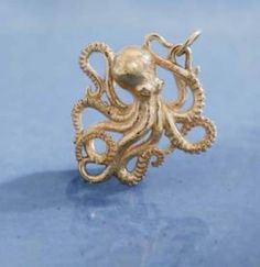 Sterling Silver or bronze detailed Octopus Charm 925 sterling silver charm size 28x24mm Ocean-inspired Gold Sterling Silver Jewelry, Gold Sterling Silver Jewelry With Starfish Charm, 15% Off Sale, Sea Creature, Sterling Silver Charm, Sea Creatures, Octopus, Charms, 925 Sterling Silver