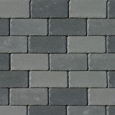 a close up view of a gray brick wall