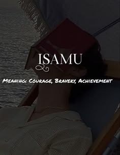 a woman sitting on top of a boat next to the ocean with a book over her head