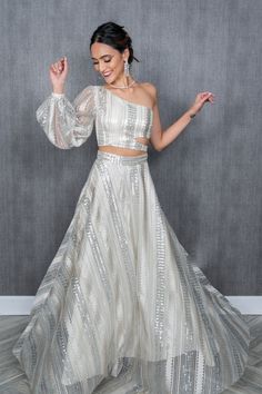 One Side Off Shoulder Blouse Lehenga, Feather Indian Outfit, Sequin Crop Top And Skirt, Crop Top And High Waisted Skirt, Crop Top And Skirt Indian Designer, White Crop Top Lehenga, Lehenga Skirt Designs, Lehenga Top Design, Crop Top And Skirt Indian Weddings