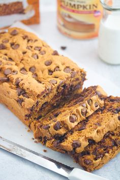 two slices of chocolate chip banana bread on a cutting board