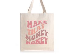 This canvas tote bag is perfect for someone who is ready to manifest money, wealth, and abundance this year! Featuring a vibrant, retro-style font that reads 'Make That Money Honey', this tote bag is sure to make a statement. Crafted from durable canvas fabric, this bag is designed to last. It also features a spacious interior, perfect for carrying your essentials. Whether you're heading to the office, to the market, or to the coffee shop, this tote bag is your perfect companion. Make that money Eco-friendly Letter Print Shoulder Bag Gift, Money Honey, Wealth And Abundance, Money Wealth, Money Manifestation, Retro Bags, Manifest Money, Cotton Sheets, Photo Lighting