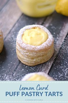 lemon curd puff pastry tarts with powdered sugar on top and the words lemon curd puff pastry tarts below