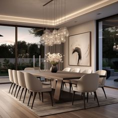 a dining room table with white chairs and a chandelier hanging from the ceiling