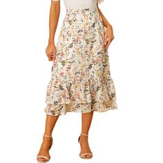 Featuring pretty ditsy floral prints, this midi skirt is a summer option that can be worn with just about anything. Channel elegant style in this midi skirt which is beautifully printed with a blossom pattern for a versatile look. It is made of lightweight fabric, adding definition to the free-flowing design. Falling to a waterfall midi hem, it sits high on the waist with a discreet side zip fastening. Summer days call for effortlessly feminine styles like skirts. Non-stretch Summer Midi Skirt, Spring Chiffon Flared Skirt, Casual Ditsy Floral Print Skirt, Spring Ruffled Maxi Skirt For Day Out, Non-stretch Ruffled Skirt For Spring, Knee-length Floral Print Skirt For Garden Party, Spring Floral Print Skirted Bottoms, Non-stretch Tiered Maxi Skirt For Spring, Spring Floral Print Tiered Skirt