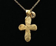 "This Ancient Gold Cross Necklace is made of high-quality components - the American-made strong gold-plated steel chain and the beautiful, expensive-looking gold-plated cross pendant, finished with a larger lobster clasp for your convenience. It will be a pleasure to wear and see. You can easily customize this necklace by choosing different chain lengths and an initial charm letter - choose it from the drop-down menu when you add items to the cart The available chain length - 14\", 16\", 18\", 20\", 22\", 24\" The main pendant size: 48 mm tall, 27 mm wide The initial letter charm size: 10 mm (please see the second photo for scale) +  EXTRA INITIAL CHARMS: https://www.etsy.com/listing/1188728114 + DANGLING BIRTHSTONES: https://www.etsy.com/listing/690860375  You will receive your necklace c Gold Plated Pendant Cross Necklace, Yellow Gold Brass Cross Pendant Necklace, Yellow Gold Brass Necklace With Cross Pendant, Handmade Brass Cross Pendant Necklace, Gold Cross Jewelry With Adjustable Chain, Spiritual Gold Cross Pendant Jewelry, Gold Cross Pendant Necklace With Adjustable Chain, Gold Pendant Cross Necklace With Adjustable Chain, Gold-tone Cross-shaped Gold-plated Jewelry