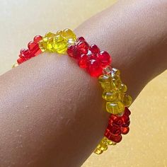 KC CHIEFS GUMMY BEAR BRACELET - Our Popular & Highly Rated Gummy Bear Bracelet is NOW available in KC CHIEFS COLORS!! Made using Clear Multi-Color Bear Beads, Czech glass spacer beads & 1mm durable elastic cord. You will receive (1) Bracelet Available ONLY in these sizes due to the pattern.  * 5.0 inches  * 6.0 inches  * 7.0 inches  * 8.0 inches * 9.0 inches  Made to order. check out my other gummy bear accessories, earrings, phone strap, phone charms!  free shipping at $35 Red Novelty Beaded Bracelets For Friendship, Novelty Red Plastic Jewelry, Red Novelty Plastic Jewelry, Trendy Red Plastic Bracelets, Trendy Red Plastic Bracelet, Red Plastic Beaded Bracelets As Gift, Handmade Red Beaded Bracelets In Novelty Style, Handmade Red Beaded Bracelets, Cute Red Beaded Bracelets For Birthday