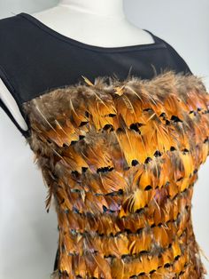 Totally weird and fabulous! Chic Evening Dress For Halloween, Black Feathered Dresses For Spring, Black Feather Dresses For Spring, Black Summer Costume Dress, Black Feathered Dress For Fall, Black Mini Dress With Feathers For Fall, Black Feather Dress For Fall, Vintage Mini Dress For Evening In Fall, Vintage Evening Mini Dress For Fall