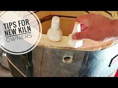 a person is using a sponge to clean a metal container with soap on it and the words tips for new kiln owners