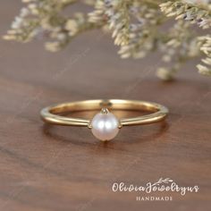 4mm Akoya Pearl Engagement Ring Yellow Gold Plain Band Women Ring Mini Pearl Art Deco Simple Ring Anniversary Ring Bridal Women Promise Gift ▶ Ring Details: ※Metal: Silver or 14K Solid Gold (Rose, White, or Yellow) ※Center Stone: Akoya Pearl, 4mm ※Band Width: approximately 1.5mm ▶Tips: ※accept return and exchange for normal orders. All returns are now eligible for a full refund! ※ Ring Size: All ring sizes are available, please contact me ※Material: As for material options - 14KW means 14k White Gold Pearl Ring With Birthstone For Fine Jewelry, Heirloom Stackable Jewelry As Gift, Gold Pearl Ring With Birthstone, Minimalist Gold Pearl Ring In Sterling Silver, Minimalist Gold Sterling Silver Pearl Ring, 14k Gold Oval Pearl Ring For Gift, Fine Jewelry Stackable Round Pearl Ring, Fine Jewelry Stackable Pearl Ring, Stackable Round Pearl Ring In Fine Jewelry Style