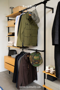 Walk-in wardrobe in light oak, featuring three rows of shelves for boxes and clothing storage, as well as hangers for shirts and jackets, dressers for organizing items in drawers. The Frame walk-in wardrobe solution is designed to ensure that you get a solution tailored to your needs. use the open wardrobe solution for clothes storage and organization for your hallway, closet, walk-in or bedroom. wardrobe design, wardrobe organization, fitted wardrobe, custom closet, closet ideas, closet diy Gear Room, Wardrobe Organization, Organizing Items, Bedroom Wardrobe Design, Hallway Closet