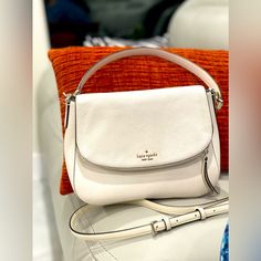 Kate Spade New York Jackson White Soft Pebbled Leather Medium Flap Shoulder Bag 11″ L X 9″ H X 3.5″ W Longer Strap Unused New Used Good Condition Tag Not Attached Kate Spade New York Jackson Medium Flap Shoulder Bag Is Chic And Functional. Holds All Your Essentials And More. Beautiful Soft Pebbled Leather With Lots Of Compartments. Kate Spade New York Jackson Medium Flap Shoulder Bag In Pebbled Leather With Silver Tone Hardware Fold-Over Flap With Magnetic Closure; Zip Pocket On Flap; Removable, Kate Spade White Bag With Top Carry Handle, White Kate Spade Bag With Top Carry Handle, Kate Spade Cream Bag With Detachable Handle, Kate Spade White Shoulder Bag With Top Carry Handle, Kate Spade Cream Bag With Adjustable Strap, Kate Spade Beige Crossbody Satchel, White Kate Spade Shoulder Bag With Top Handle, Kate Spade Cream Bag For Everyday Use, Kate Spade Cream Crossbody Shoulder Bag