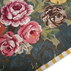 an area rug with flowers on it