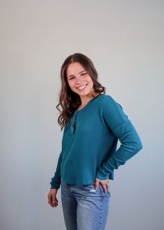 This henley long-sleeve tee from Bobi is the perfect comfortable, yet stylish basic to add to your capsule wardrobe. It features a soft, waffle knit fabric, drop shoulders, snap buttons by the neckline, and a cropped hem that sits right at the top of the hips. Pair with your favorite jeans and sneakers. Details: 56% cotton, 40% modal, 4% spandex Machine washable TTS Casual Waffle Knit Henley For Fall, Fall Waffle Knit Henley With Henley Neckline, Everyday Long Sleeve Waffle Knit Tops, Everyday Fall Henley, Fall Everyday Waffle Knit Henley, Fall Waffle Knit Henley For Everyday Wear, Everyday Fall Waffle Knit Henley, Fall Waffle Knit Henley, Green Waffle Knit Long Sleeve Top