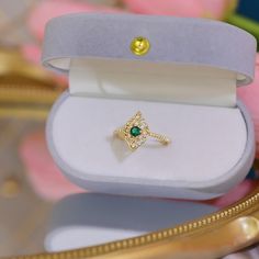 Please Note: When adjusting the ring, please squeeze or expand the ring body slowly and gently. Material Cubic Zirconia 14k Gold Electroplated - Lasts longer than regular platings Measurement Adjustable Open Design Size 5.5 and up Adjustable Open Emerald Ring For Promise, Gold Cubic Zirconia Open Emerald Ring, Adjustable Emerald Open Ring, Adjustable Open Emerald Ring For Wedding, Adjustable Open Emerald Ring, Open Ring Birthstone Ring For Proposal, Gold Open Ring With May Birthstone, Gold Adjustable Rings For Proposal, May Birthstone Diamond Open Ring