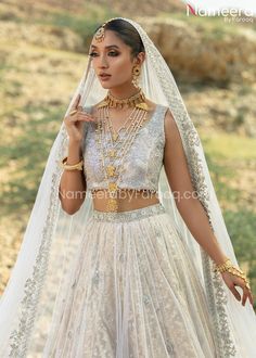 Buy Classy White Choli Bridal Lehenga Pakistani, a royal masterpiece to wear at a wedding. The perfectly stitched Bridal Lehenga Dress is available Online. Traditional Marriage Sets With Intricate Embroidery, Wedding Sets With Intricate Kundan Embroidery, Traditional Gold Wedding Dress With Dupatta, Wedding Choli With Intricate Embroidery In Kundan, Wedding Sets With Intricate Embroidery And Kundan, Elegant Gold Choli For Traditional Ceremonies, Bollywood Style Lehenga With Intricate Design, Bollywood Style Semi-stitched Lehenga With Intricate Design, Bollywood Wedding Dress With Intricate Embroidery For Traditional Ceremonies