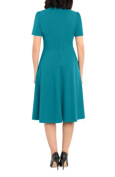 This dainty short sleeve dress is a retro inspired staple that's perfect for any well-dressed occasion. 45" length Necktie Short sleeves Back zip closure Lined 96% polyester, 4% spandex Hand wash, dry flat Imported Model Stats: 5'10" height; 34" bust; 27" waist; 35" hips. Maggy London, Short Sleeve Dress, Teal Green, Well Dressed, Necktie, Retro Inspired, Sleeve Dress, Nordstrom Rack, Neck Tie