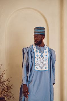 Traditional Trims - Sky Blue Premium 3 Piece Agbada Set - Long Sleeve Size: Please order the Kaftan according to our Traditional Trims sizing guide or bespoke measurements. Material: Kaftans are crafted from high-quality premium wool. Color Selection: Explore our range of available colors, providing you with a diverse color selection to choose from to suit your preferences and style. Functionality: This Kaftan set is versatile, making it ideal for various events or celebrations such as weddings, business meetings, dates, parties, engagement shoots, birthdays & etc. It's also perfect for casual everyday wear. Care Instructions: Preferably dry clean or wash in cold water. Please avoid using bleach. Imported: All outfits are handcrafted with detail and imported from Nigeria. Delivery: Please Blue Long Sleeve Agbada For Eid, Blue Kurta With Traditional Patterns For Ceremonies, Blue Agbada With Traditional Patterns For Ceremonies, Blue Agbada For Traditional Ceremonies, Blue Traditional Agbada For Ceremonies, Traditional Blue Agbada For Ceremonies, Traditional Fitted Agbada With Long Sleeves, Traditional Blue Agbada With Traditional Patterns, Traditional Blue Long Sleeve Agbada