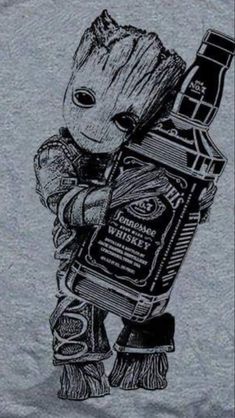 a t - shirt with a baby groote holding a bottle in it's hands