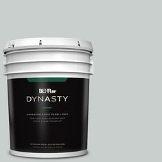 a white paint bucket with the words dynaasty on it's side