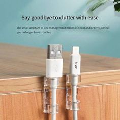 two usb cables connected to each other in front of a wooden surface with text that reads, say goodbye to clutter with ease