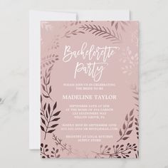 a pink and brown bachelor party card with leaves on it, in front of a marble background