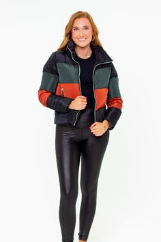 Puffer Jackets don't get more stylish than this! The Addison is the perfect addition to your winter coat collection! She features a zip up and snap closure, a color-block design, and two side pockets! Pair her with leggings, bodysuit, and sneakers for a cute on-the-go look! Product Details: Fit: The Addison Jacket fits true to size. Length: The small measures 23.5" from shoulder to hem. Bust: Accommodating to most bust sizes. Waist: Relaxed fit Fabric: ﻿Fabric does not contain stretch. Material: Trendy Fall Puffer Jacket For Cold Weather, Spring Urban Outerwear With Contrast Color, Urban Outerwear With Contrast Color For Spring, Sporty Puffer Jacket For Fall Cold Weather, Sporty Puffer Jacket For Cold Weather And Fall, Fall Outerwear With Contrast Color For Outdoor, Fall Outdoor Outerwear With Contrast Color, Fall Color Block Long Sleeve Outerwear, Fall Streetwear Outerwear With Contrast Color