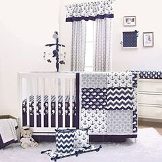 a baby crib bedding set in blue and white