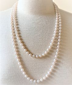 "Natural Faux Pearl Necklace with Gold Tone Spring Ring Clasp Pearls Measure 8mm in Diameter ( 1/4\" in Diameter ) Mot Pearls are Natural Pearl Color 16\" 7.00 18\" 8.50 24\" 9.50 29\" 10.50 36\" 10.50 Endless ( without clasp ) 46\" 11.00 Endless ( without clasp ) COMPLIMENTARY DOMESTIC SHIPPING" Classic Long Necklace For Weddings, Classic Long Pearl White Necklace, Classic Long Single Strand Necklace, Elegant Round Long Necklace As Gift, Classic White Long Necklace As A Gift, Classic White Long Necklace As Gift, Classic Long Necklace For Formal Occasions, Pearl Necklace With Gold, Wedding Jewellery Necklace