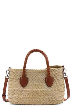 Coconut-palm straw is woven to form this lightly structured tote that's topped with braided-leather shoulder straps for chic, effortless carry. Magnetic closure Top carry handles; removable, adjustable shoulder strap Unlined Coconut-palm straw with leather trim Imported Brown Straw Bag With Intrecciato Weave, Beige Rectangular Straw Bag With Intrecciato Weave, Spring Top Handle Bag In Woven Leather, Spring Woven Leather Top Handle Bag, Brown Intrecciato Weave Straw Bag For Travel, Natural Straw Bag With Intrecciato Weave And Top Handle, Beige Straw Bag With Woven Leather Top Handle, Beige Straw Bag With Intrecciato Weave And Top Handle, Spring Jute Straw Bag With Leather Handles