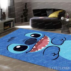 a rug with a cartoon character on it in the middle of a living room area