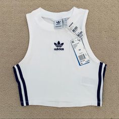 Bnwt. Adidas Crop Top With Three Stripes. Size Xs. Perfect Condition. Offers Questions Discounted Bundles Fast Shipping Trades Lowballing Check Out My Other Listings! White Cotton Sports Crop Top, White Sporty Crop Top For Spring, Sporty White Crop Top For Spring, Trendy White Crop Top For Sports, White Crop Top For Spring Streetwear, Fitted Top With Three Stripes Branding For Summer, White Adidas Top For Spring, White Tops With Three Stripes Branding For Spring, Trendy White Adidas Tops