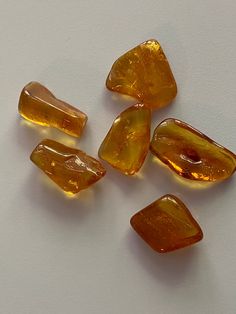 This is for one 2-3 gram piece of genuine Baltic Amber.  Amber stone is popular as it has marvelous metaphysical properties for psychic protection.  It aids manifestation, and eases stress by clearing phobias and fears, and it is a lovely warm stone to wear. It is not strictly speaking a stone at all, but is a fossilized resin.  It is a powerful healer that gives the person who wears it a lovely sense of health and healing. Amber helps to balance the emotions, clear the mind and release negative energy. In the past it was commonly used in areas where it is found. Those that used it and kept it on their body as jewelry or talismans would have been aware that it helped to improve their health.  ~Liz Oakes Agate Art, Releasing Negative Energy, Amber Resin, Crystal Pattern, Psychic Protection, Amber Gemstone, Amber Crystal, Buy Crystals, Amber Stone