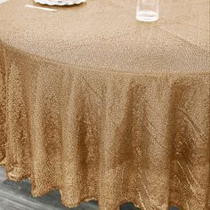 Glorify the tables at your event with this breathtaking masterpiece to elevate the party decorations with its impeccable grandeur. Our Premium Sequin Tablecloth is crafted seamlessly with numerous shimmery sequins to swathe your event from top to bottom while transforming the space into an ambiance of timeless elegance. 48 Table, Sequin Material, Sequin Tablecloth, Banquet Tables, Themed Events, Catering Services, Round Tablecloth, Accent Table, Corporate Events