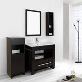 a bathroom with a sink, mirror and cabinets on the wall next to each other