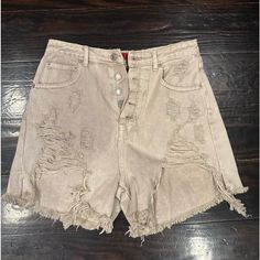 Size Medium. Brand New With Tags Casual Distressed High-waisted Jean Shorts, Trendy Distressed Short Bottoms, Beige Denim Bottoms For Summer, Summer Beige Denim Bottoms, Casual Distressed High-waisted Shorts, Distressed Short Jeans For Spring, Distressed High Waist Jean Shorts For Spring, Distressed High Rise Cotton Jean Shorts, High Waist Distressed Jean Shorts For Spring