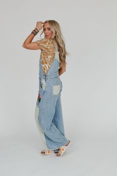 Turn a staple into a statement piece with our playful and stylish City Garden Floral Overalls! Whether you're strolling through a weekend market, attending a music festival, or simply embracing a laid - back day with friends you'll love them because they feature: Comfortable denim fabric Loose and oversized, wide leg, overall, jumpsuit silhouette Classic square neckline and adjustable overall style straps SO CUTE contrasting floral and paisley print fabric patches and embroidered flower patch de Floral Overalls, Paisley Print Fabric, Weekend Market, Boho Essentials, Day With Friends, Bralette Outfit, Denim Day, City Garden, Sweater Sale