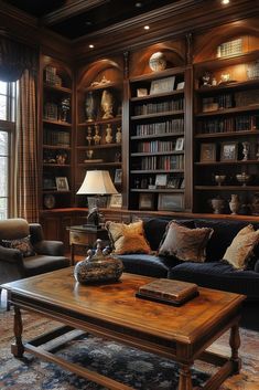 a living room filled with lots of furniture and bookshelves covered in shelves full of books