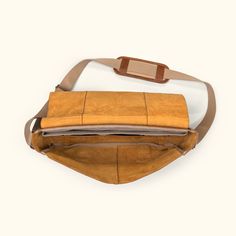 rustic leather messenger bag for laptops and commuters Luxury Coated Canvas Saddle Bag For Everyday Use, Luxury Everyday Saddle Bag In Coated Canvas, Luxury Everyday Coated Canvas Saddle Bag, Luxury Flap Shoulder Bag For Travel, Luxury Coated Canvas Flap Bag For Travel, Classic Coated Canvas Satchel With Flap, Classic Coated Canvas Flap Satchel, Luxury Flap Bag For Travel, Luxury Travel Flap Bag