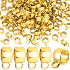 gold plated metal spacers and rings on a white background