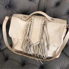 Sam Edelman New!!! Nwot!!!!!! Beautiful!!!!! Ivory, Light Beige, Silver Hardware Leather Fringe Details On Front Foldover Top With Magnetic Button Closure Large Single-Back Slip Pocket Inner 1 Zip Pocket Approx. 10" H X 13" W X 4" D 1.25" Handle Drop 11" Strap Drop Cream Crossbody Flap Bag For Everyday, Cream Top Handle Hobo Bag With Detachable Strap, Cream Hobo Bag With Detachable Strap And Top Handle, Cream Hobo Bag With Detachable Strap, Cream Flap Shoulder Bag With Adjustable Strap, Cream Rectangular Shoulder Bag With Handle Drop, Cream Shoulder Flap Bag With Adjustable Strap, Cream Crossbody Shoulder Bag With Detachable Handle, Cream Shoulder Flap Bag For Everyday