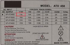 an electronic device is shown with red marks on the back side of it, indicating that there are two different types of electrical devices