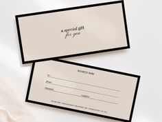 two black and white business cards with the words a special gift for you on them