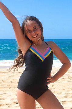 This fun & sporty one-piece swimsuit is a new favorite!! The cut & style is back by popular demand, and for good reason! Here are a few of our favorite features of the Rikki: Elastic bands in RAD colors: yellow, blue & pink Adjustable back-ties to fit all body types Sewn-in padding (sizes 12-16 only) Embroidered RAD logo on hip Fully lined in our signature embossed motto “you are beautiful” Striped Stretch Swimwear For Sunbathing, Striped Stretch Swimwear For Sports, Striped Stretch Tankini For Pool, Striped Stretch Swimwear For Swimming, Striped Fitted Swimwear For Sports, Sporty Striped Swimwear For Beach Season, Summer Striped Stretch Tankini, Striped Stretch Summer Tankini, Playful Striped Swimwear For Beach