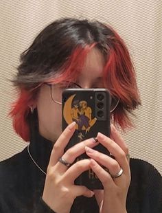 Black Hair Red Underneath Short, Black With Red Streaks Hair, Two Red Streaks In Front Of Hair, Under Red Hair Dye, Red Streaks Short Hair, Red Underdye Hair Wolfcut, Red Hair Streaks Short Hair, Red Hair Color For Short Hair, Underlayer Hair Dye Short Hair