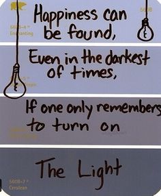 three different signs with the words happiness can be found, even in the dark of times, if one only remembers to turn on