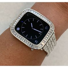 Fits the Apple Watch available for sizes 38mm 40mm 42mm 44mm in series 2,3,4,5,6 or SE. Custom Apple Watch Band with Large Baguette CZ Stones. This is high on the bling with a silver stainless steel band that features rows of high quality Cubic Zirconia pave rhinestones and baguette stones. For the ultimate in sparkle, add the matching 14K Gold Plated Lab Diamond Baguette bezel. Your choice of colors: Silver, Rose Gold or Gold, product and watch size. The band will fit series 1, 2, 3,4,5,6,SE EX Silver Apple Watch Band, Silver Apple Watch, Custom Apple Watch Bands, Silver Apple, Apple Band, Gold Apple Watch, Bracelet Apple Watch, Ceramic Watch, Gold Apple