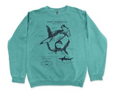 Wildlife anatomical designs screen printed onto quality stitched cotton/poly sweatshirts. These sweatshirts are designed to spark conversation. Each shirt is twined and tagged giving a classic nautical presentation. Makes a perfect & thoughtful gift for any animal lover in your life. Sweatshirt stats: * 80% ringspun cotton & 20% polyester * Soft washed garment dyed fabric * 1x1 rib on collar, cuffs, and waistband * Double-needle collar * Twill taped back neck * Rolled-forward shoulder * Shark Anatomy, Marine Biology Shirts, Shark Sweater, Shark Illustration, Shark Sweatshirt, Stitch Sweatshirt, Beach Sweatshirt, Shark Gifts, Science Illustration