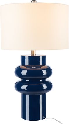 a blue lamp with a white shade on it